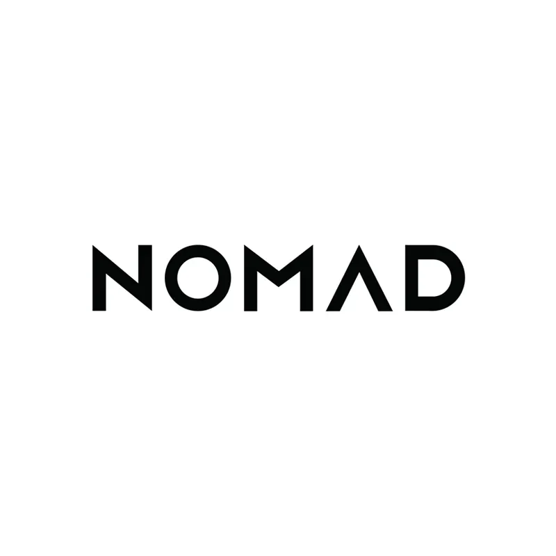 Black text logo spelling "NOMAD" in bold, modern, geometric font on a white background.